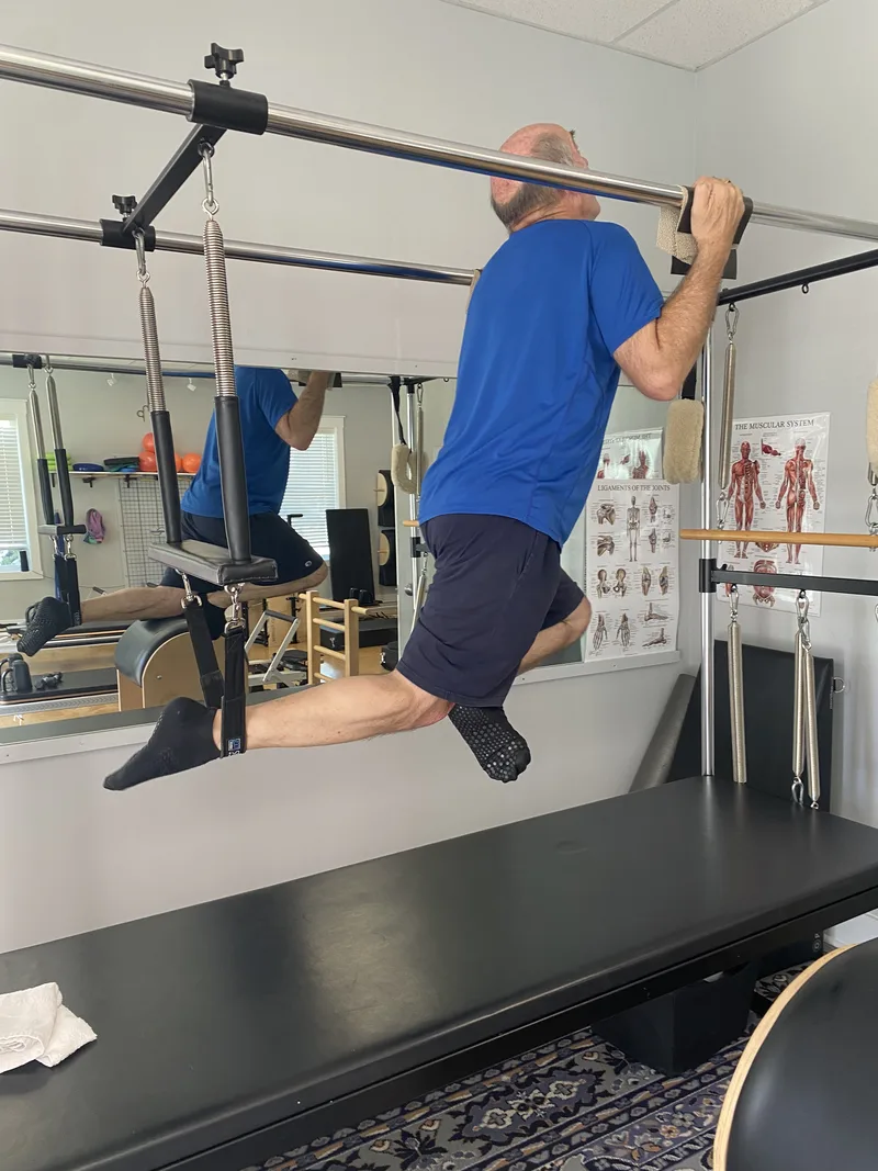 Athletic Pilates Tower workout at Dancing Hammock — advanced movement on the tower